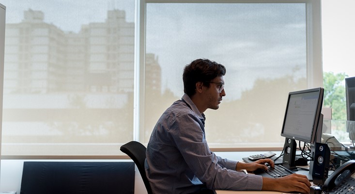 Man sitting at computer working